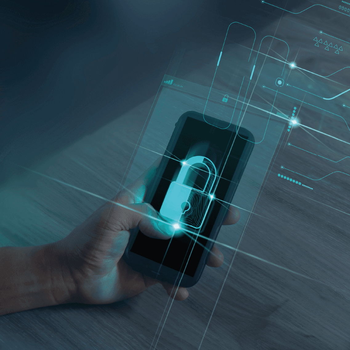 Telefon komórkowy a na nim symbol kłódki